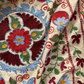 Bold multicoloured large Suzani fabric, additional detail view